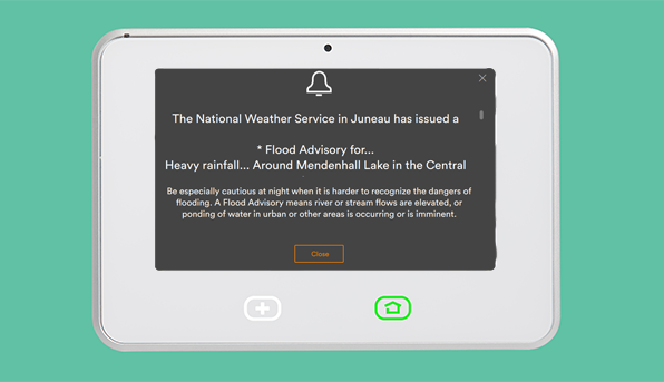Vivint smart hub touchscreen showing a severe weather alert message