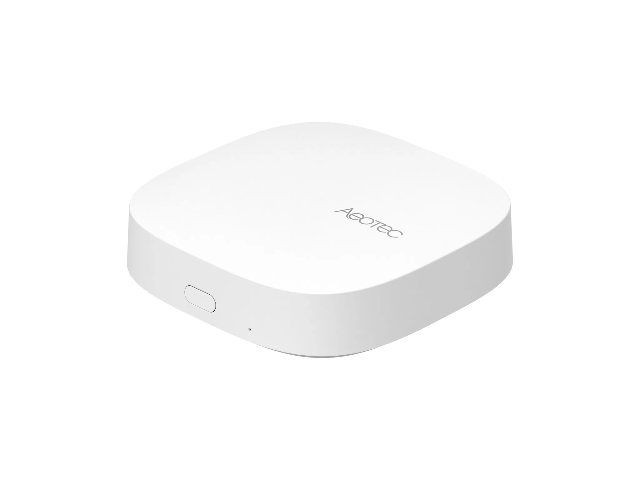 White Samsung Aeotec Smart Home Hub 2 puck photographed from the side