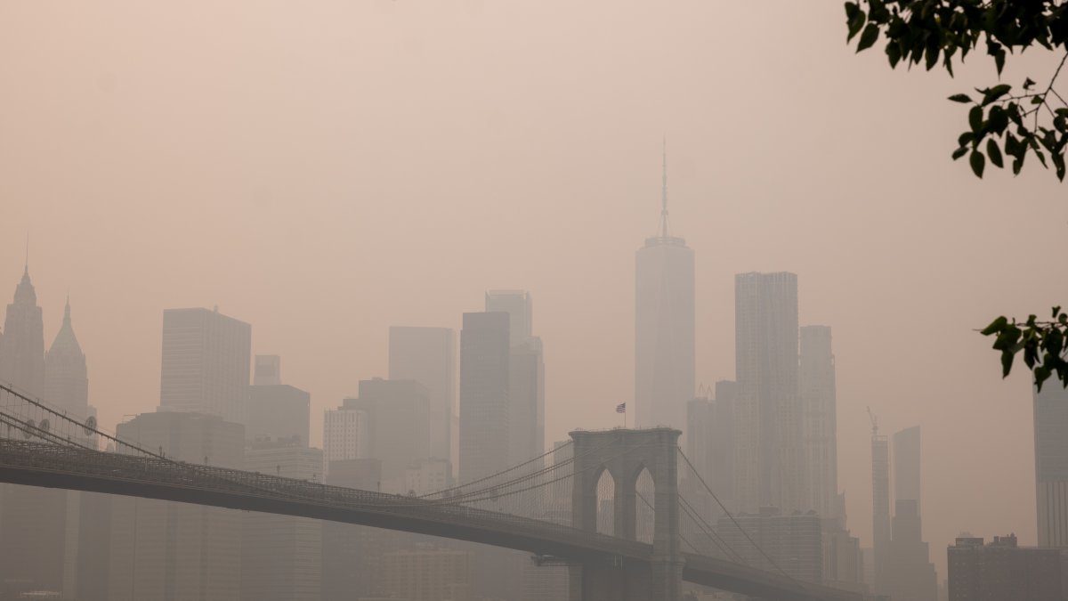 Wildfire smoke blankets the New York City skyline during a severe air quality event