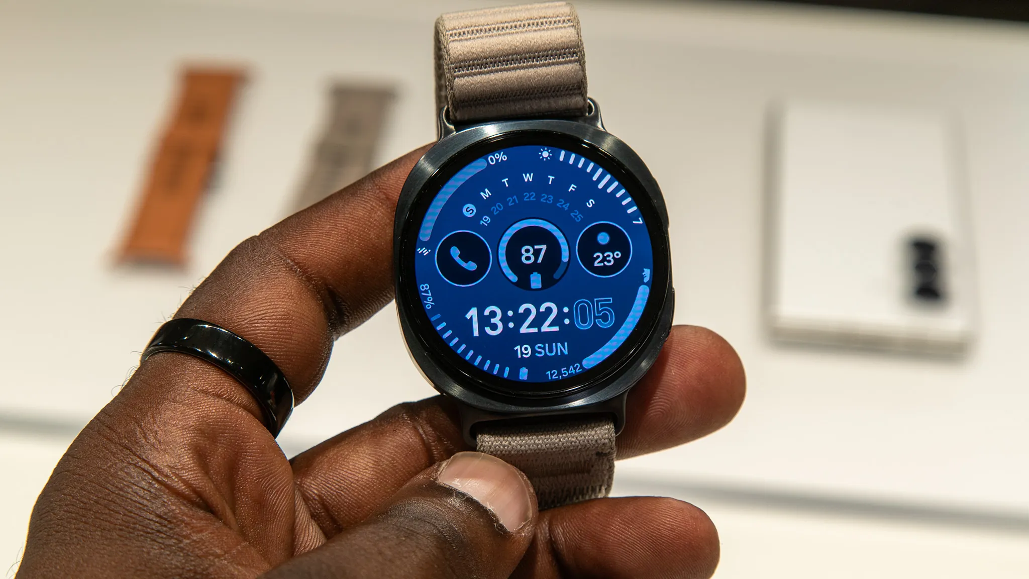 Studio product render of the Samsung Galaxy Watch 9 smartwatch with round display and strap