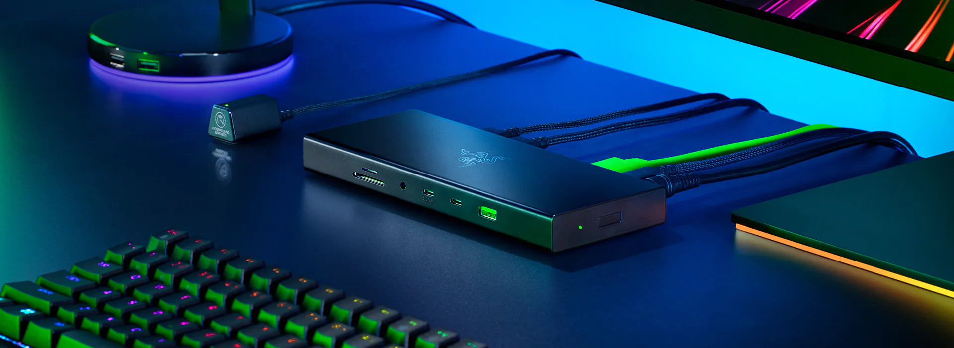 Razer USB4 Dock on a dark desk with front USB-C and USB-A ports