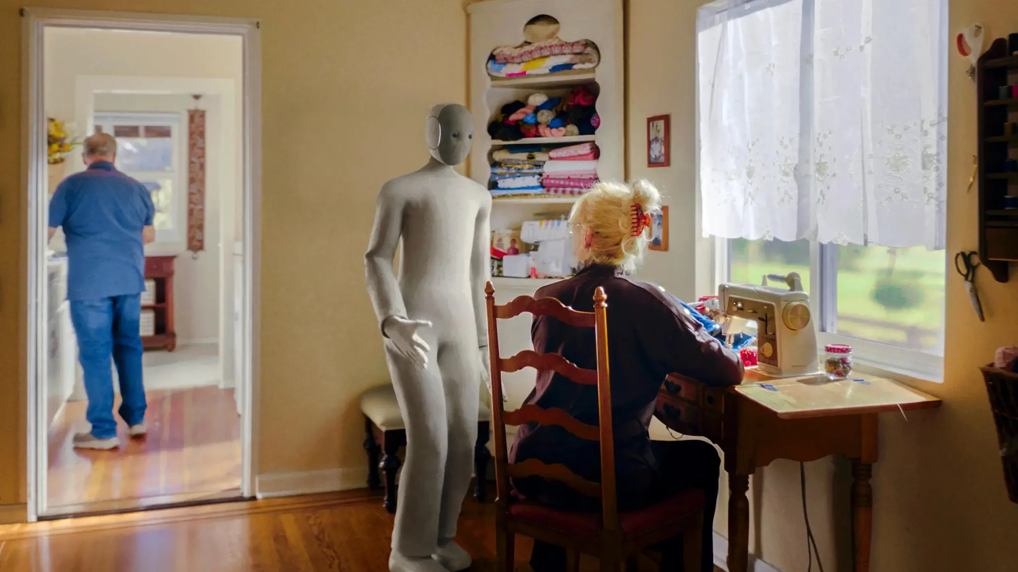 1X NEO humanoid robot standing in a home setting