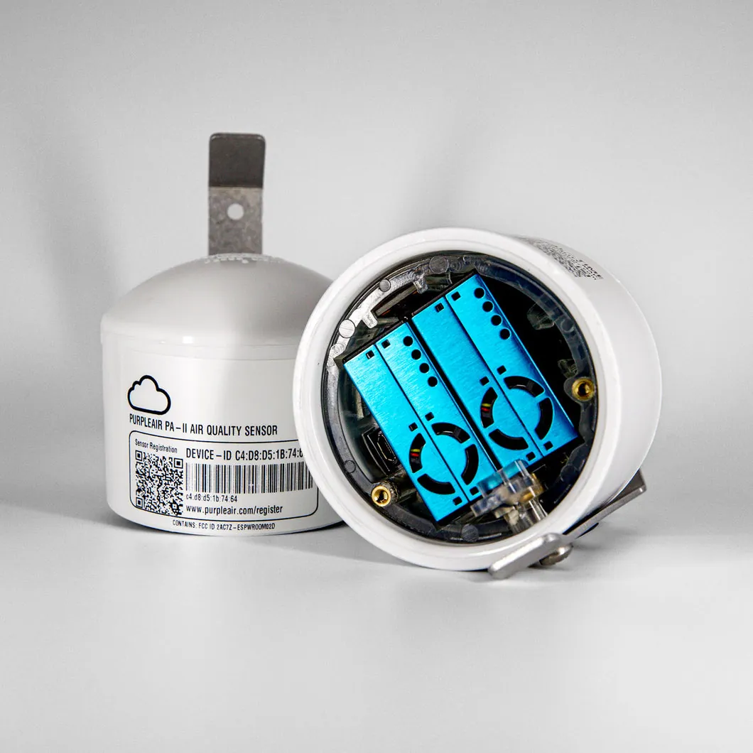 PurpleAir Classic Plus air quality monitor with dual laser particle counters mounted outdoors