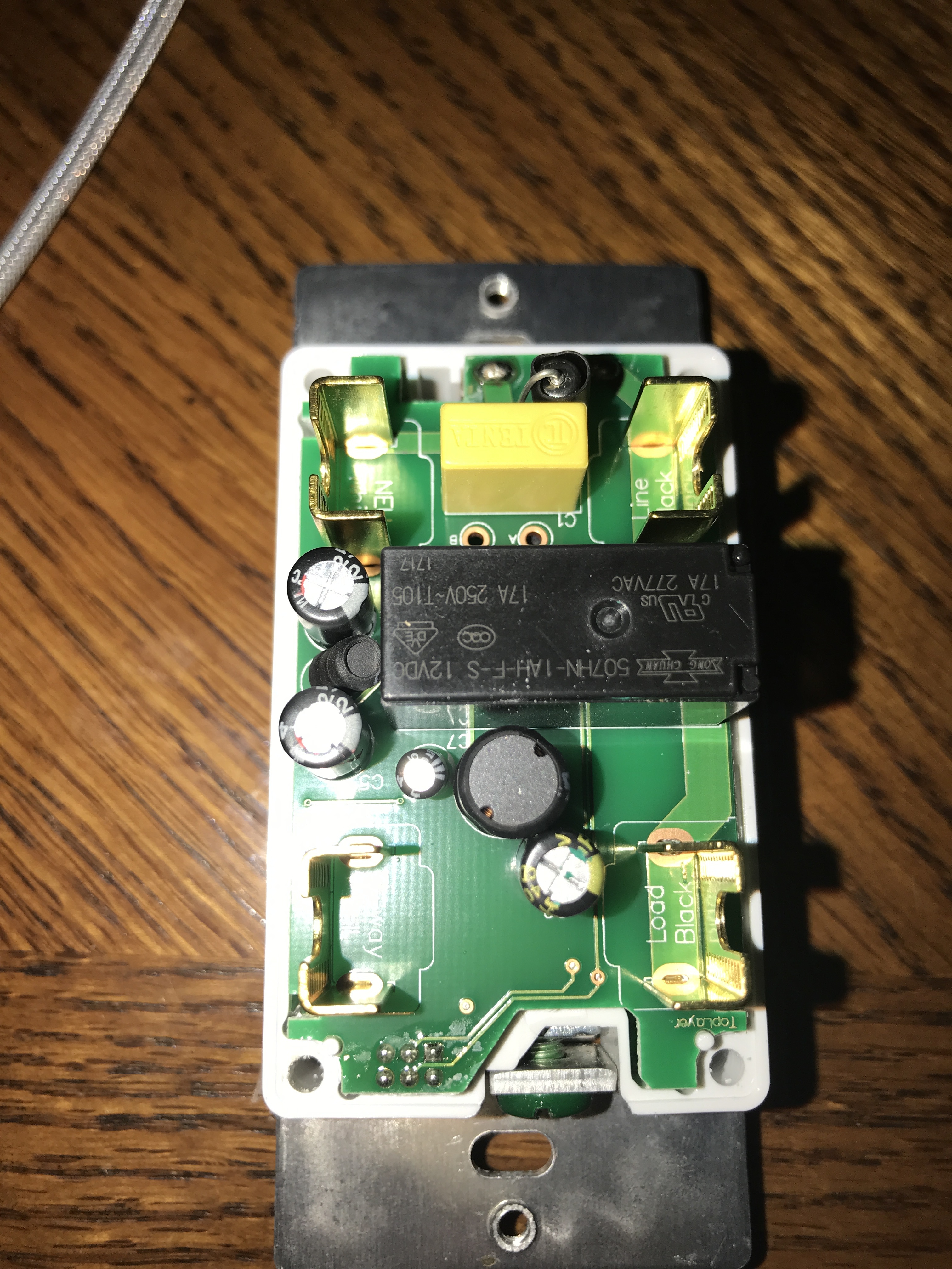 GE/Jasco Z-Wave switch circuit board showing the failed C7 10µF 25V capacitor