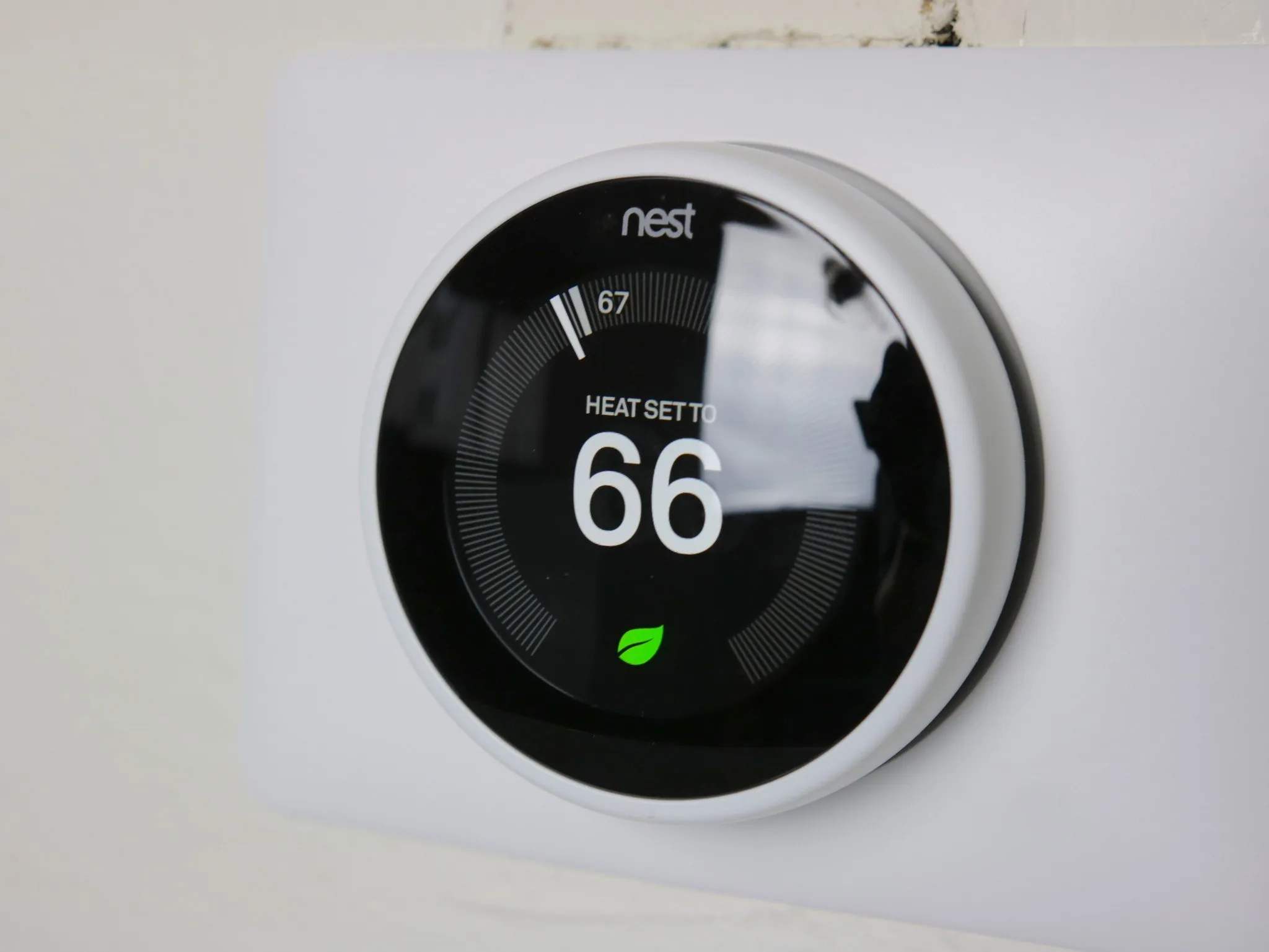 Nest thermostat display showing Eco Temperature settings