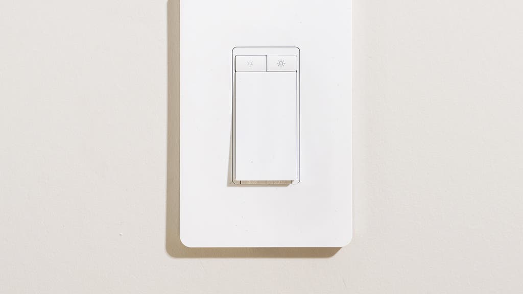 Row of smart light switches and dimmers arranged for product comparison