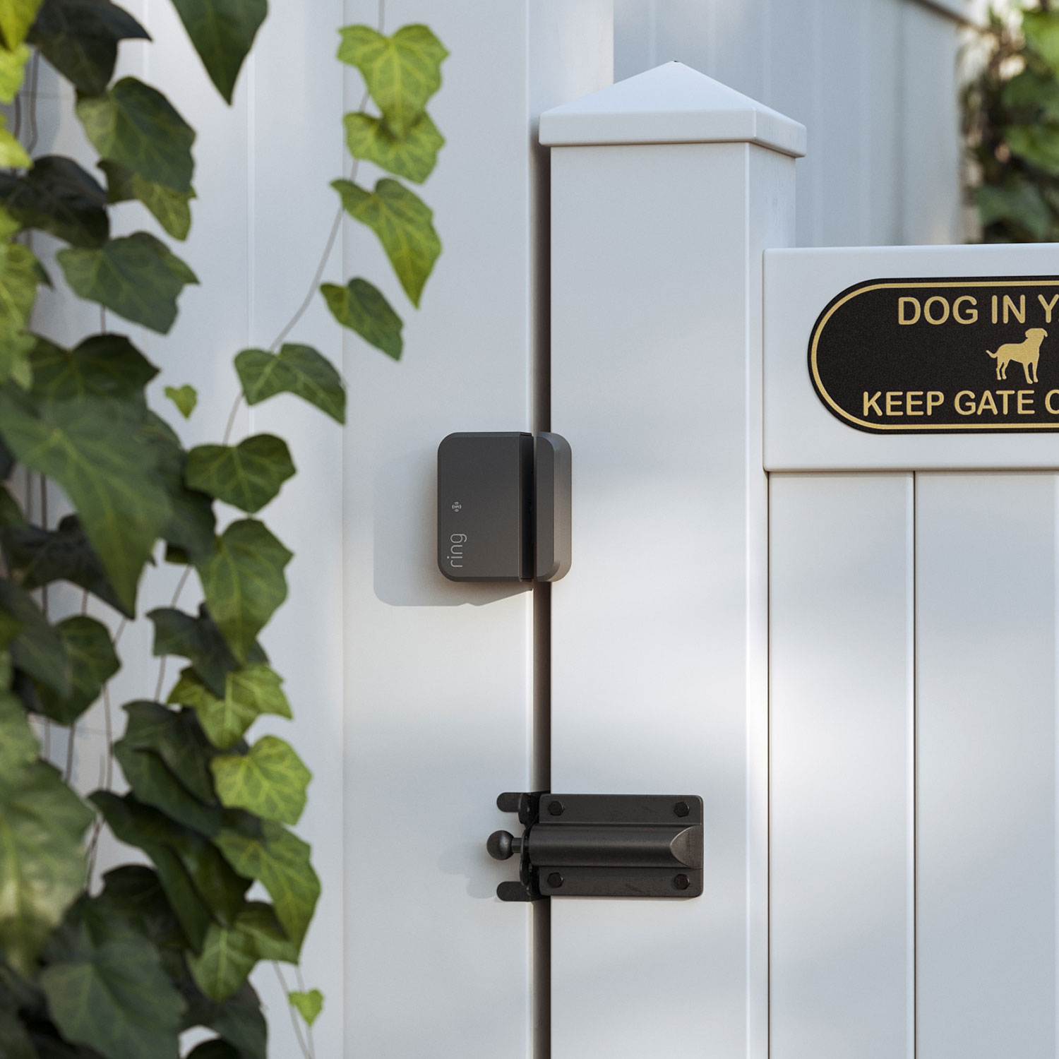 Ring Alarm Outdoor Contact Sensor mounted on an outdoor gate frame