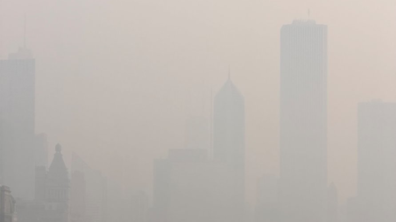 Chicago skyline shrouded in thick wildfire smoke haze during the July 2026 Canadian wildfire event