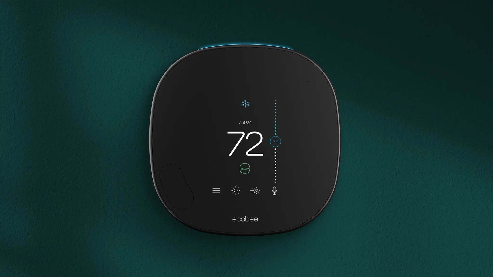 Ecobee smart thermostat mounted on a wall in a home scene